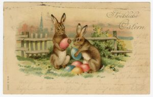 Osterkarte mit zwei Hasen und Ostereiern